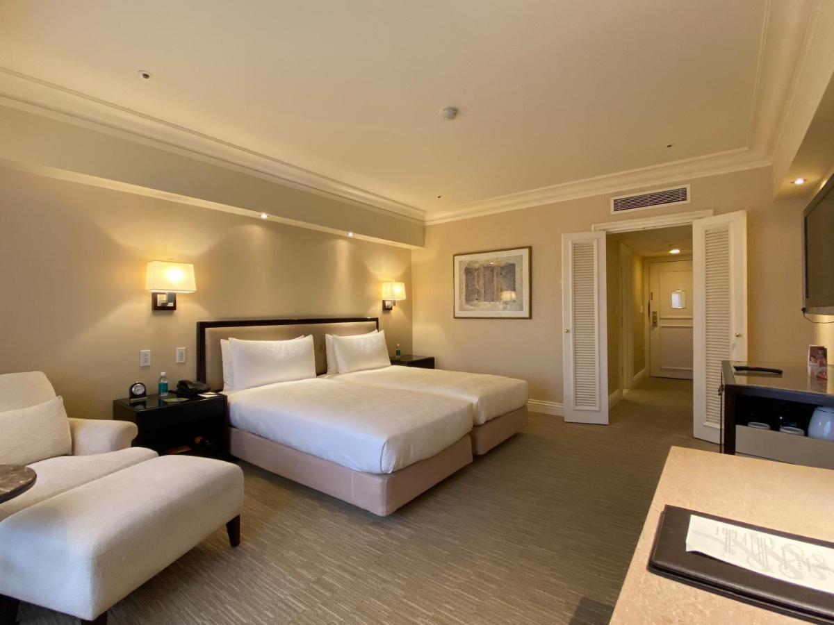 The Sherwood Taipei Eksteriør bilde A room at the Fullerton Hotel